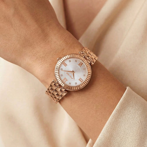 Woman wearing Police ladies Magnificence rose gold watch.