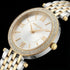 Close-up of Police ladies Magnificence gold two-tone watch.