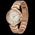 Police ladies Attraction pearl dial rose gold watch tilted to the left.