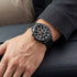 Man wearing Police Weston all black men's watch.