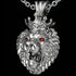 Close-up of stainless steel roaring lion head king crown necklace.