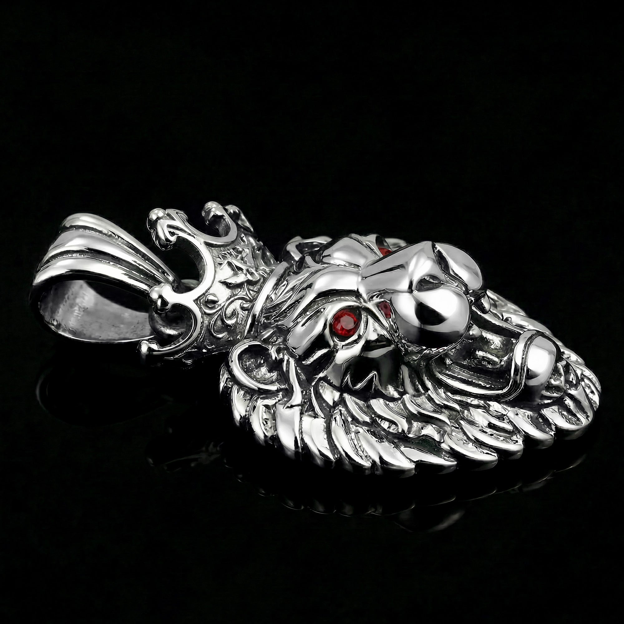 Stainless steel roaring lion head king crown necklace on black mirror surface.