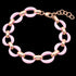 Sterling silver rose gold pink ceramic circle link bracelet with extendable length links.