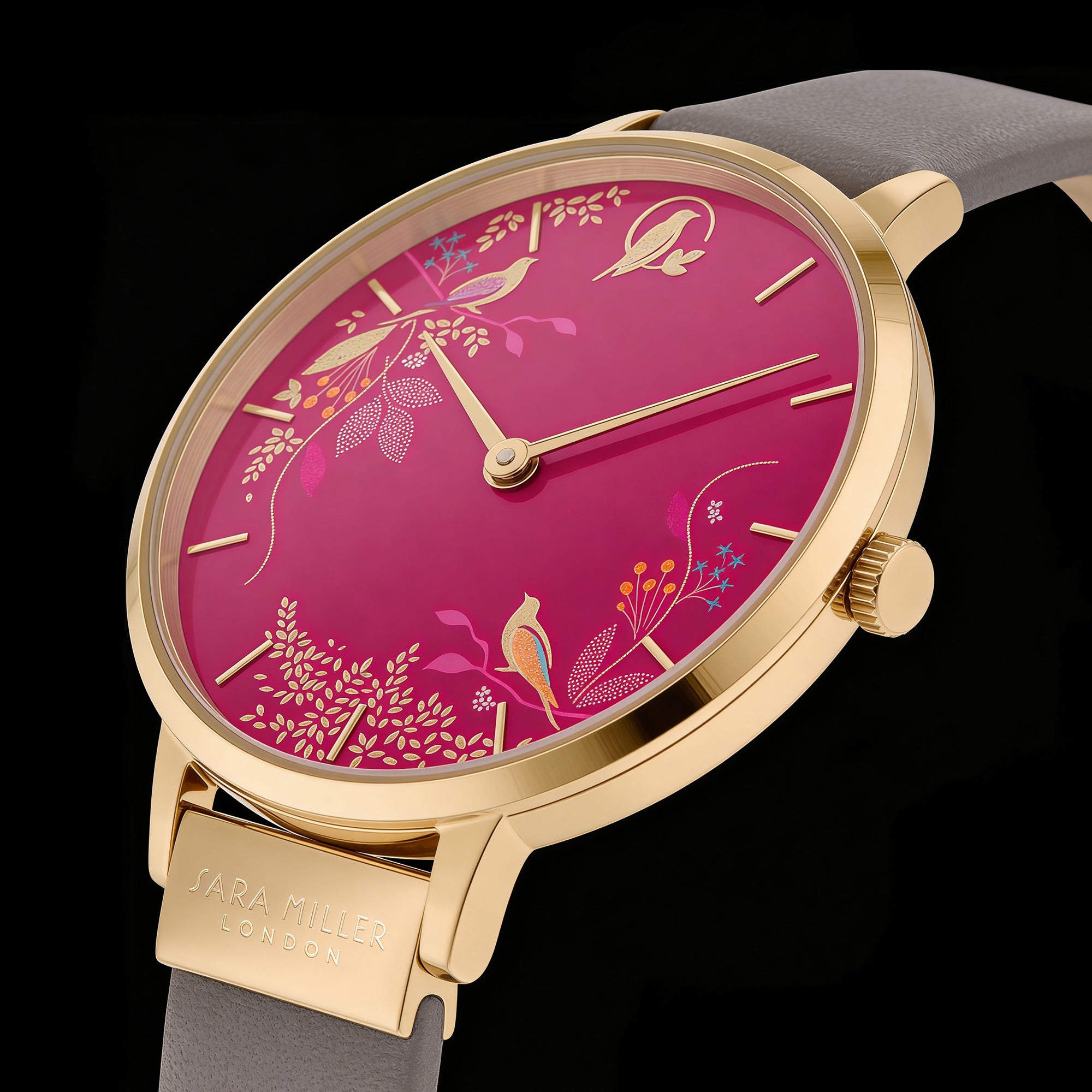 Side view of Sara Miller Chelsea Birds 34mm pink dial gold watch.
