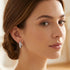 Woman wearing Engelsrufer sterling silver 20mm CZ hoop earrings.