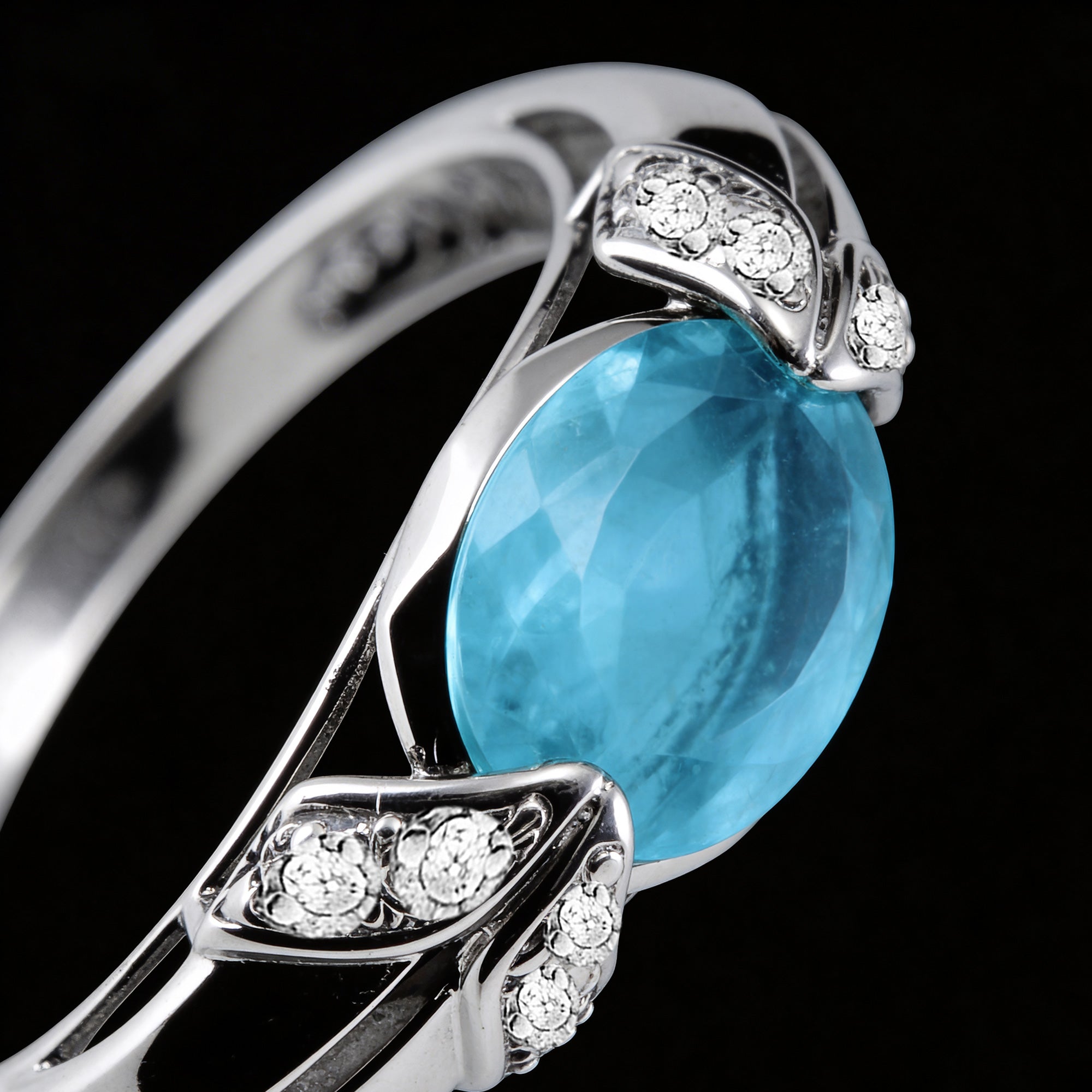 Close-up of sterling silver oval cut aquamarine ladies ring.