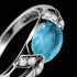 Close-up of sterling silver oval cut aquamarine ladies ring.