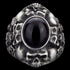 Front facing view of memento mori skull cluster stainless steel men's ring.
