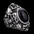 Memento Mori skull cluster stainless steel men's ring tilted to the right.