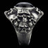 Side view of memento mori skull cluster stainless steel men's ring.