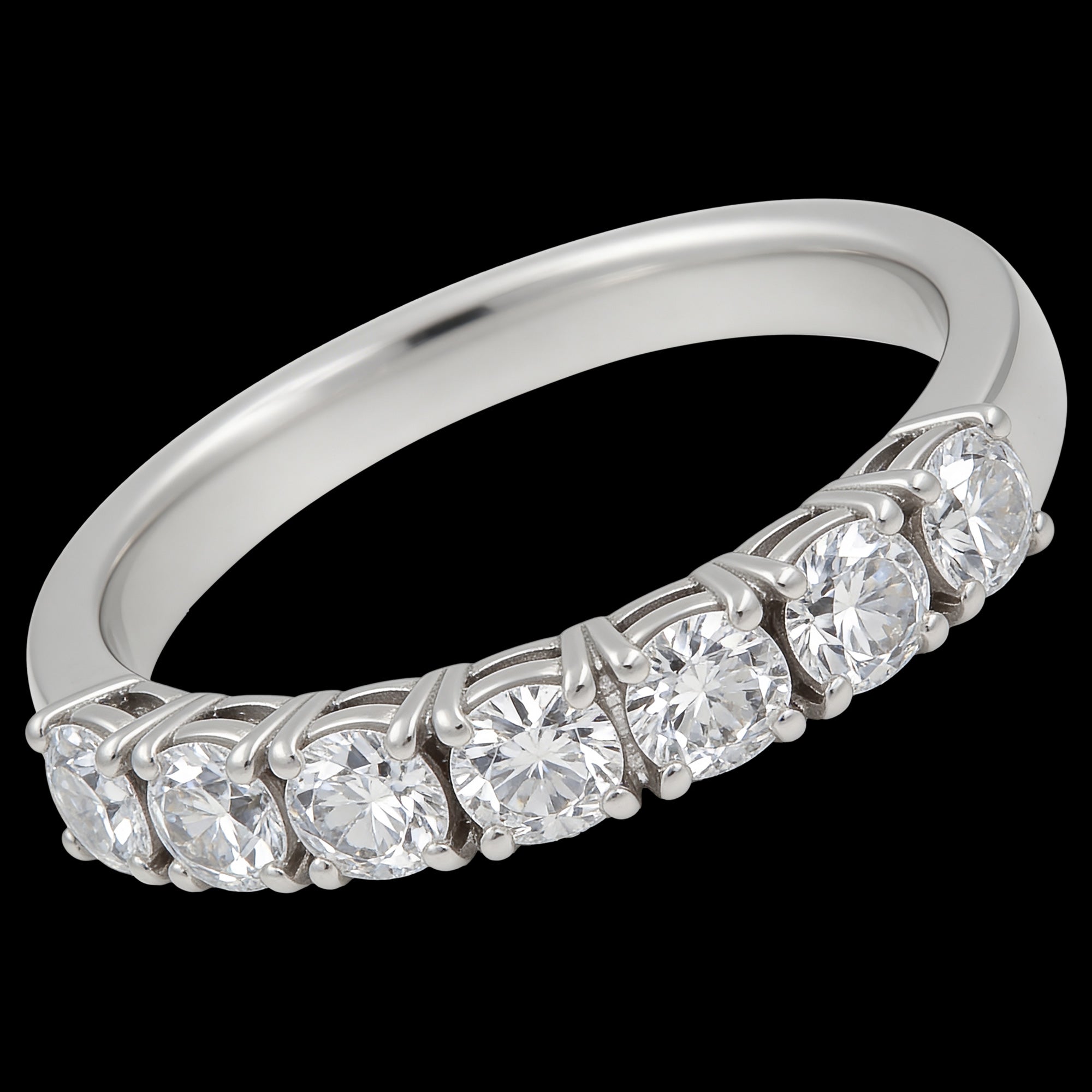Front angle of stainless steel seven stone CZ shared prong ring.