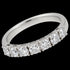 Front angle of stainless steel seven stone CZ shared prong ring.