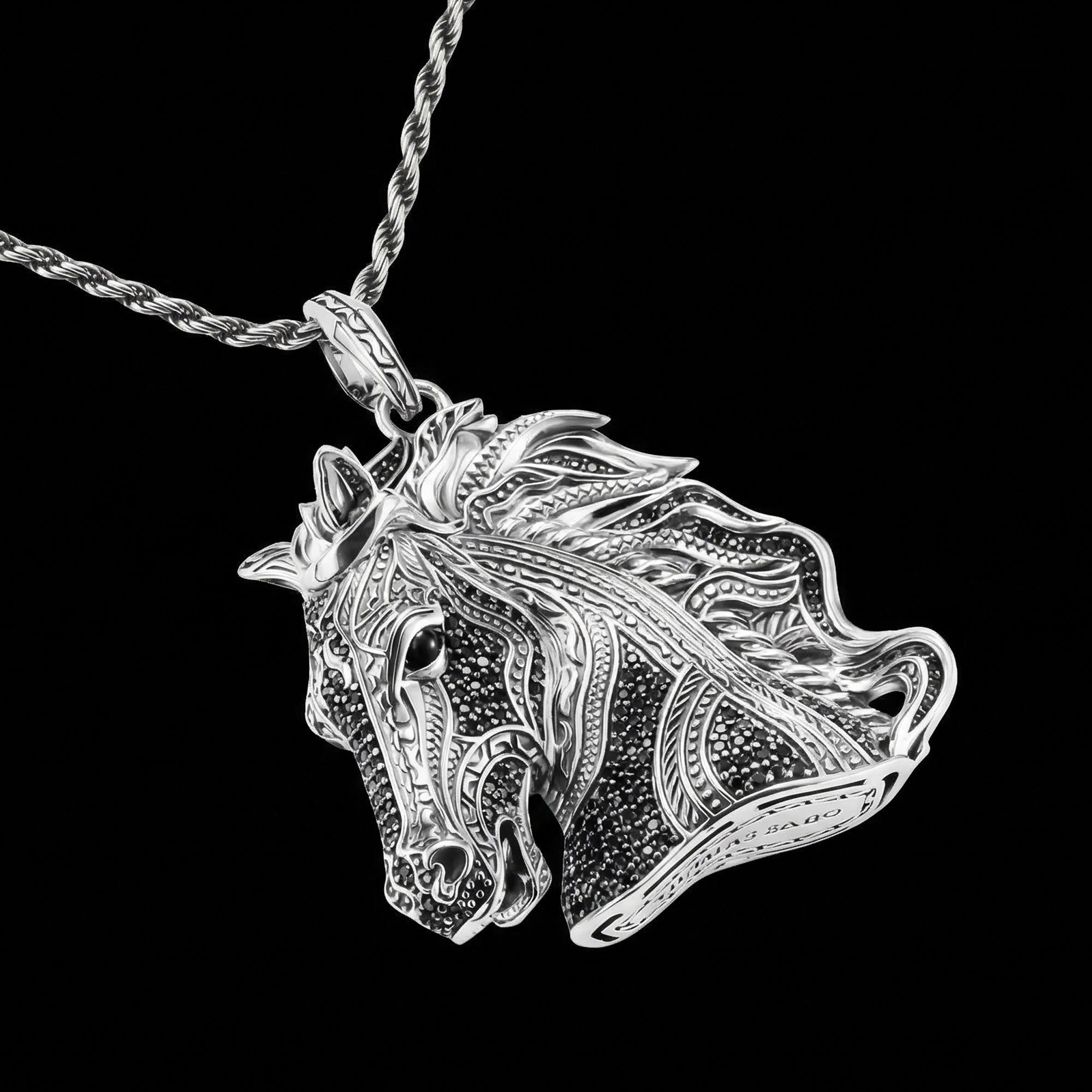 Thomas Sabo Wild Horses large horse head pendant with a chain laying flat.