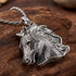 Thomas Sabo Wild Horses large horse head pendant laying on a piece of desiccated wood.