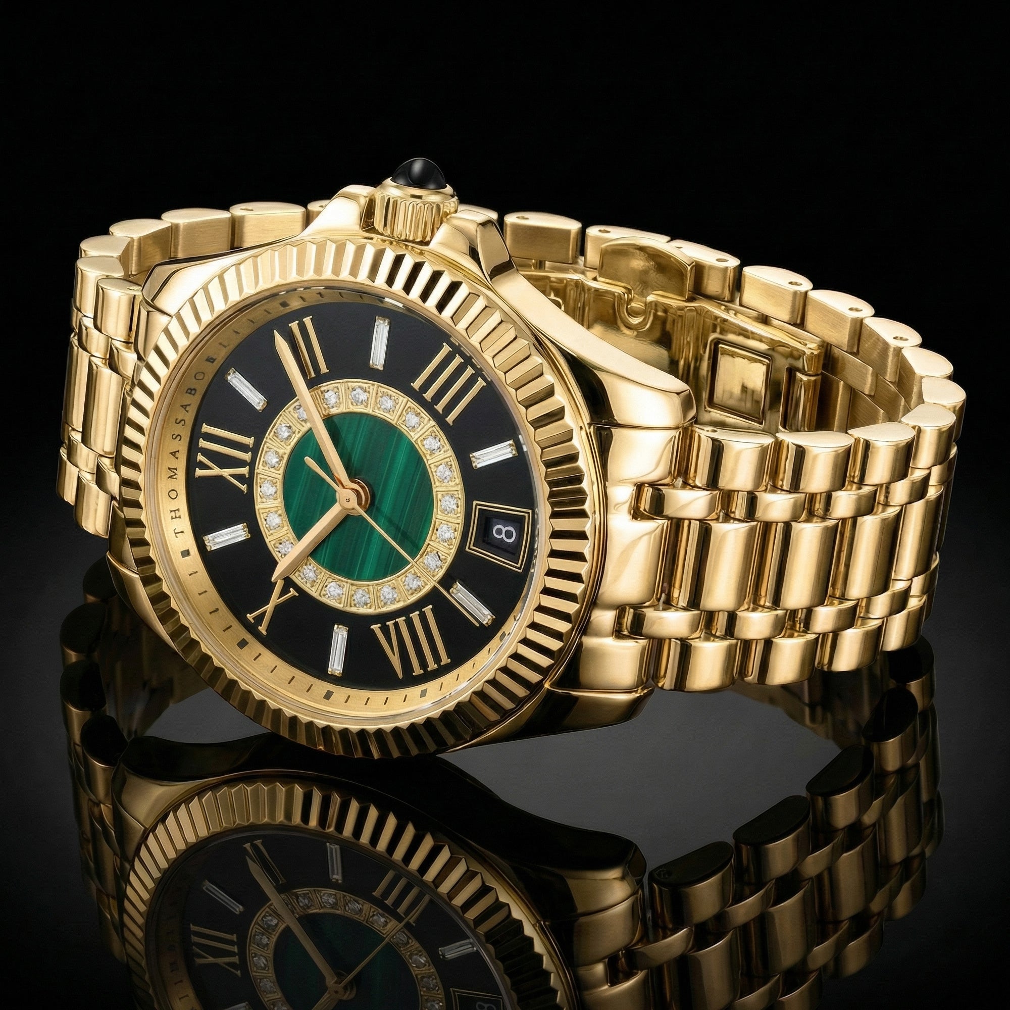 Thomas Sabo Mystic Island gold malachite watch sitting on a black mirror surface.