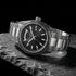Thomas Sabo Rebel At Heart Revive 40mm black dial watch laying on a piece of black slate.