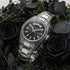 Thomas Sabo Rebel At Heart Revive 40mm black dial watch laying on a heath surrounded by black roses.