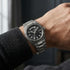 Man wearing Thomas Sabo Rebel At Heart Revive 40mm black dial watch on his wrist.