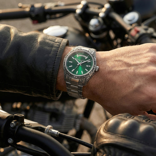 Man in a leather jacket standing next to a motorcycle wearing a Thomas Sabo Rebel At Heart Revive 36mm green dial watch.