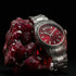 Thomas Sabo Rebel At Heart Revive 36mm red dial watch laying against a raw red ruby cluster.