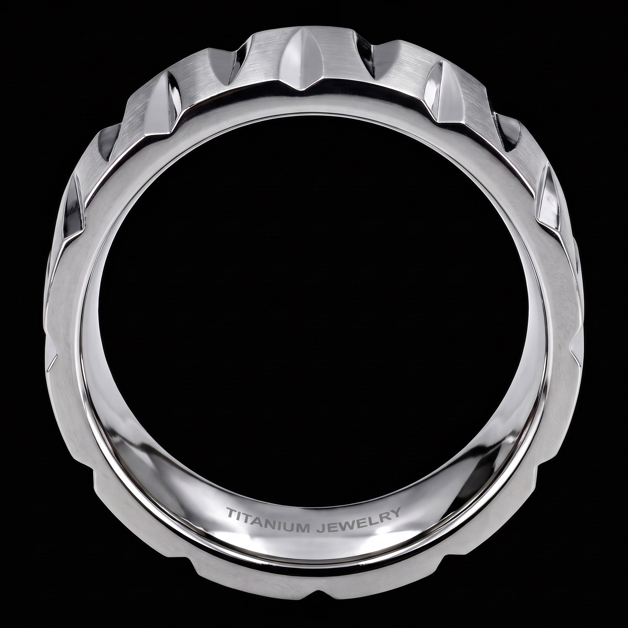 Side view of a titanium tapered groove matt finish ring.