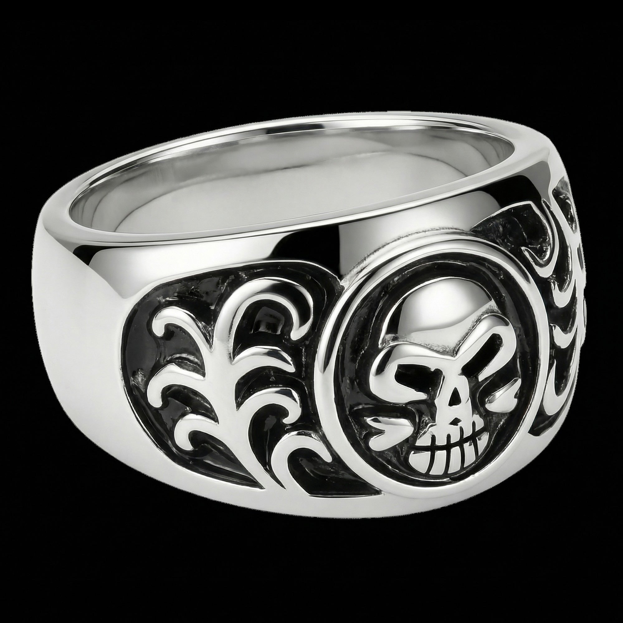 Side tilt view of men's tribal skull stainless steel ring.