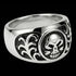 Side tilt view of men's tribal skull stainless steel ring.