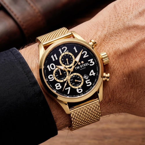 Man wearing a TW Steel VS88 Volante gold black dial numbers chronograph watch on his wrist.