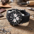 TW Steel Simeon Panda black dial 48mm grandeur tech TS11 watch on a wooden work bench with metal shavings.
