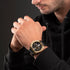 POLICE NORWOOD MEN'S GOLD BLACK LEATHER WATCH - WRIST VIEW