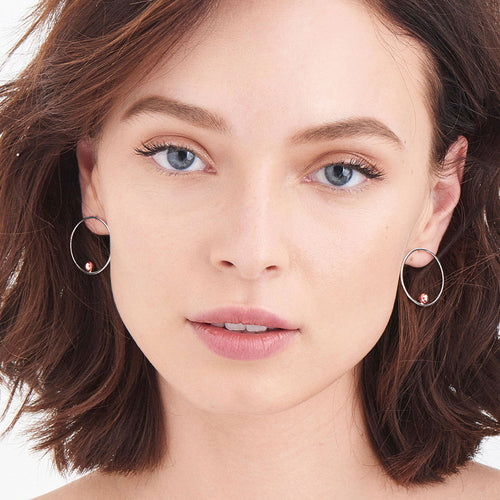 ANIA HAIE OUT OF THIS WORLD SILVER & ROSE GOLD ORBIT FRONT HOOP EARRINGS - MODEL VIEW