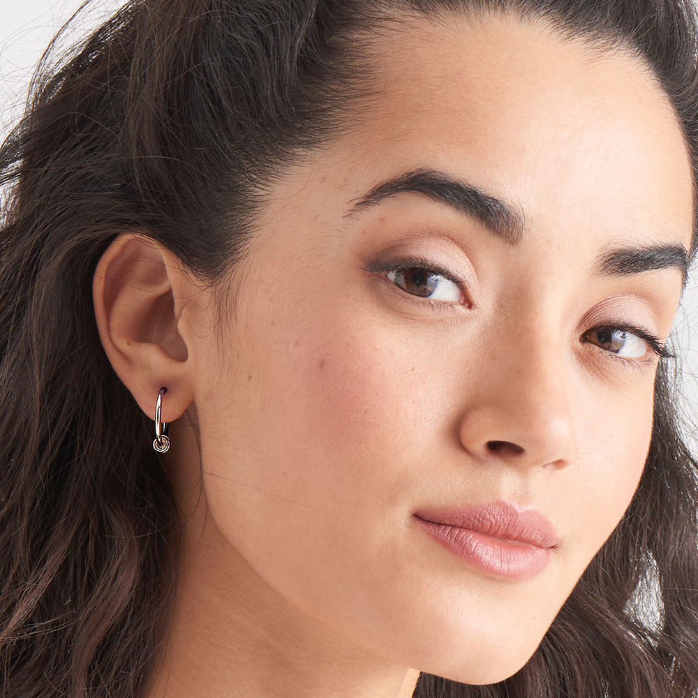 ANIA HAIE MINIMALISM SILVER MODERN HOOP EARRINGS - MODEL VIEW