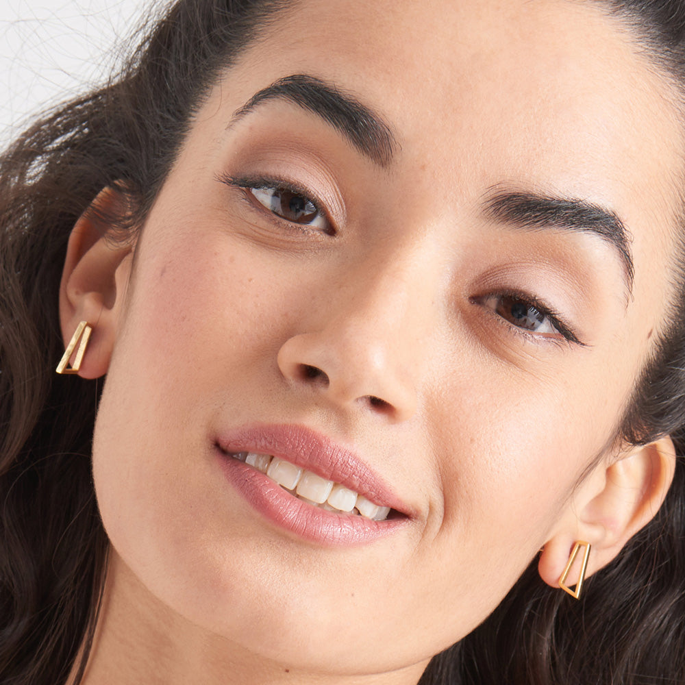 ANIA HAIE ALL EARS GOLD PRISM STUD EARRINGS - MODEL VIEW