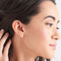 ANIA HAIE MINERAL GLOW GOLD OPAL COLOUR STUD EARRINGS - MODEL VIEW