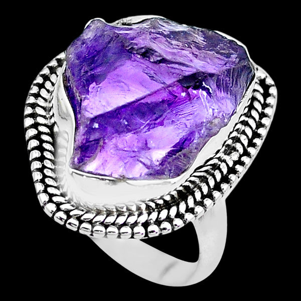 STERLING SILVER 10 CARAT ROUGH AMETHYST SURROUND RING