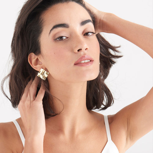 ANIA HAIE METAL CRUSH GOLD CRUSH SQUARE STUD EARRINGS - MODEL VIEW