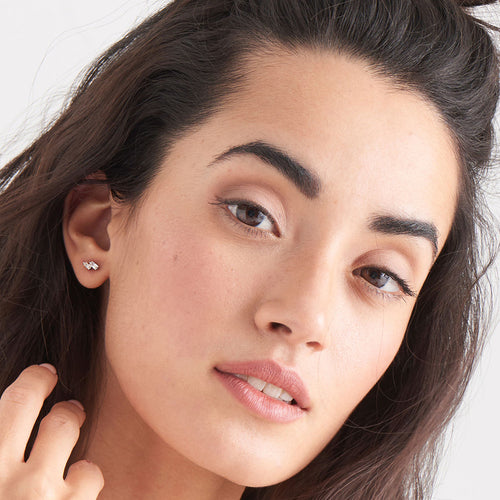 ANIA HAIE GLOW GETTER SILVER GLOW STUD EARRINGS - MODEL VIEW