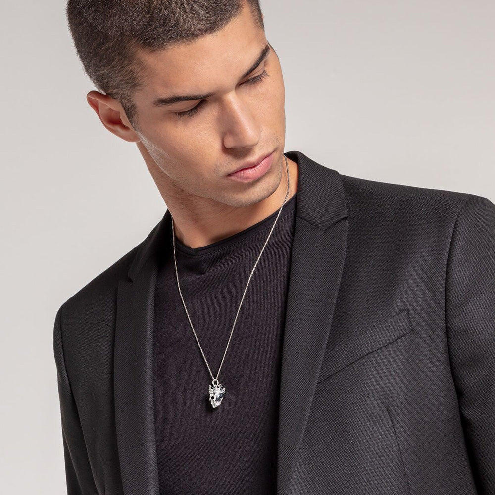 THOMAS SABO SILVER CROWN SKULL PENDANT - MALE MODEL VIEW
