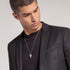 THOMAS SABO SILVER CROWN SKULL PENDANT - MALE MODEL VIEW