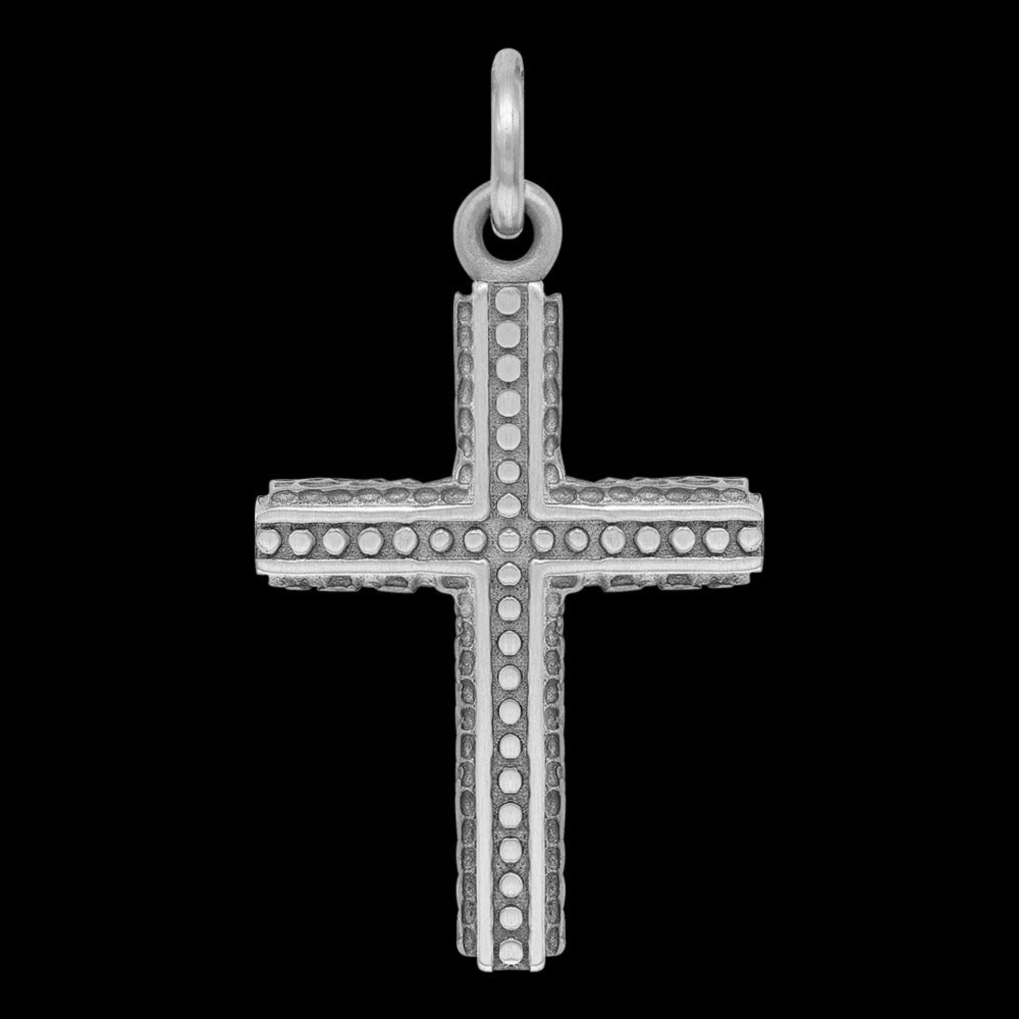 Close-up of faith cross pendant from men's faith cross & wing stainless steel necklace.