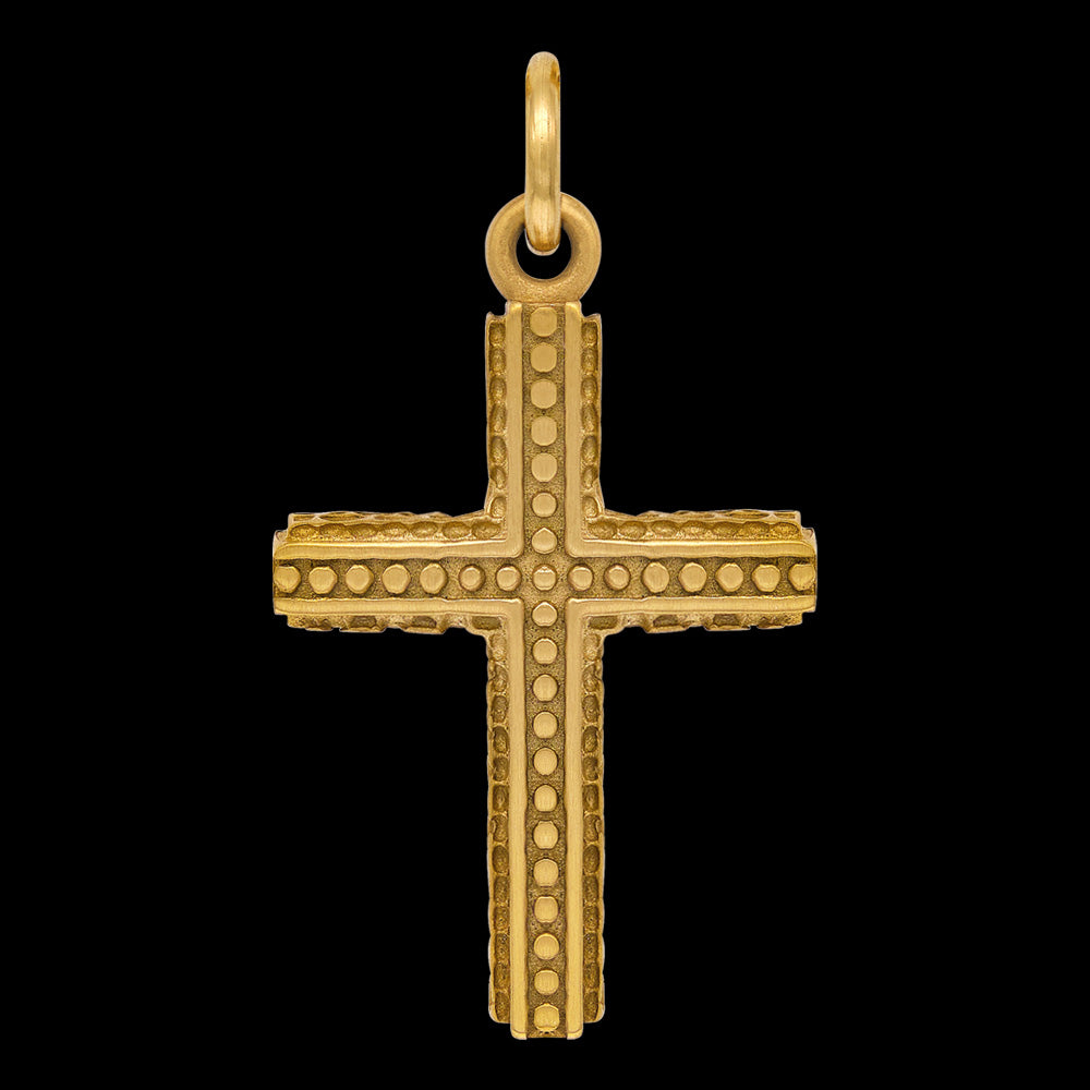 Close-up of faith cross pendant from men's faith cross & wing gold stainless steel necklace.