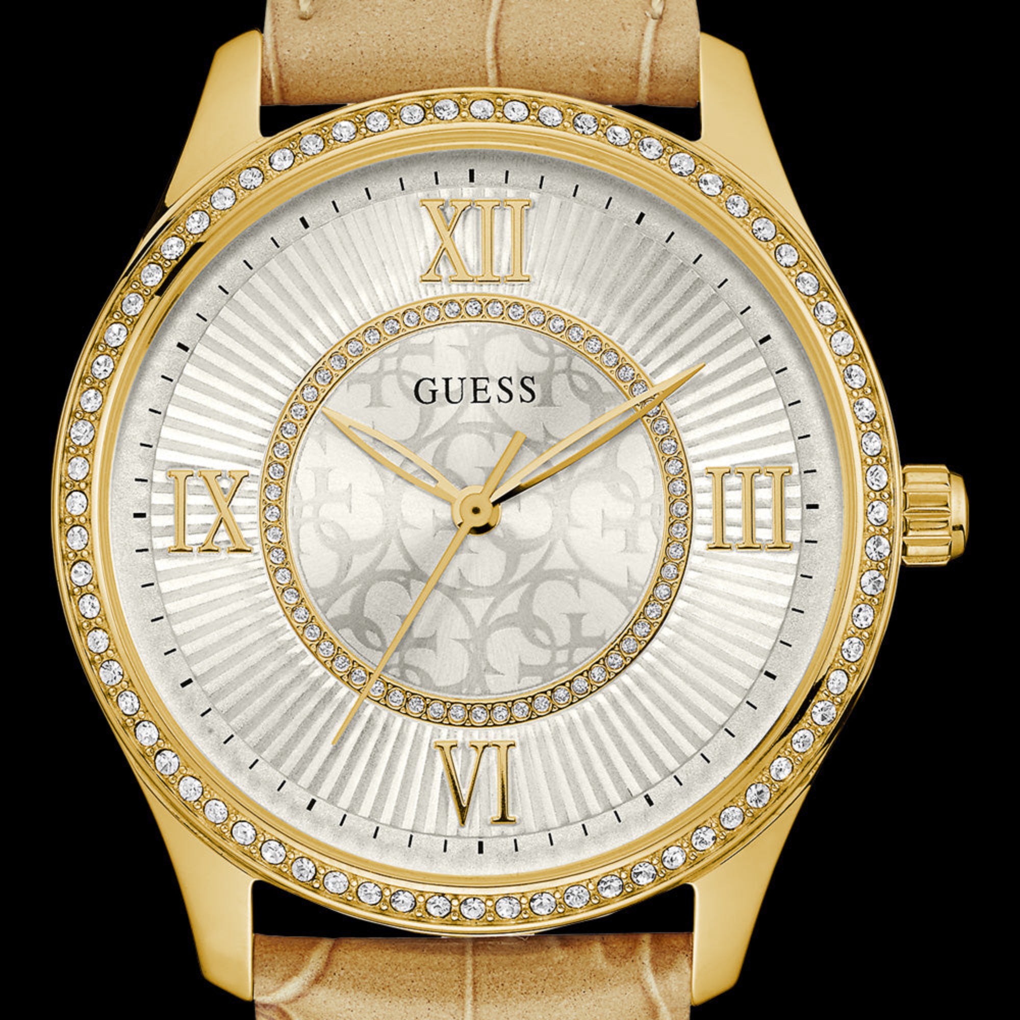 Close-up of Guess Broadway gold ladies dress watch.