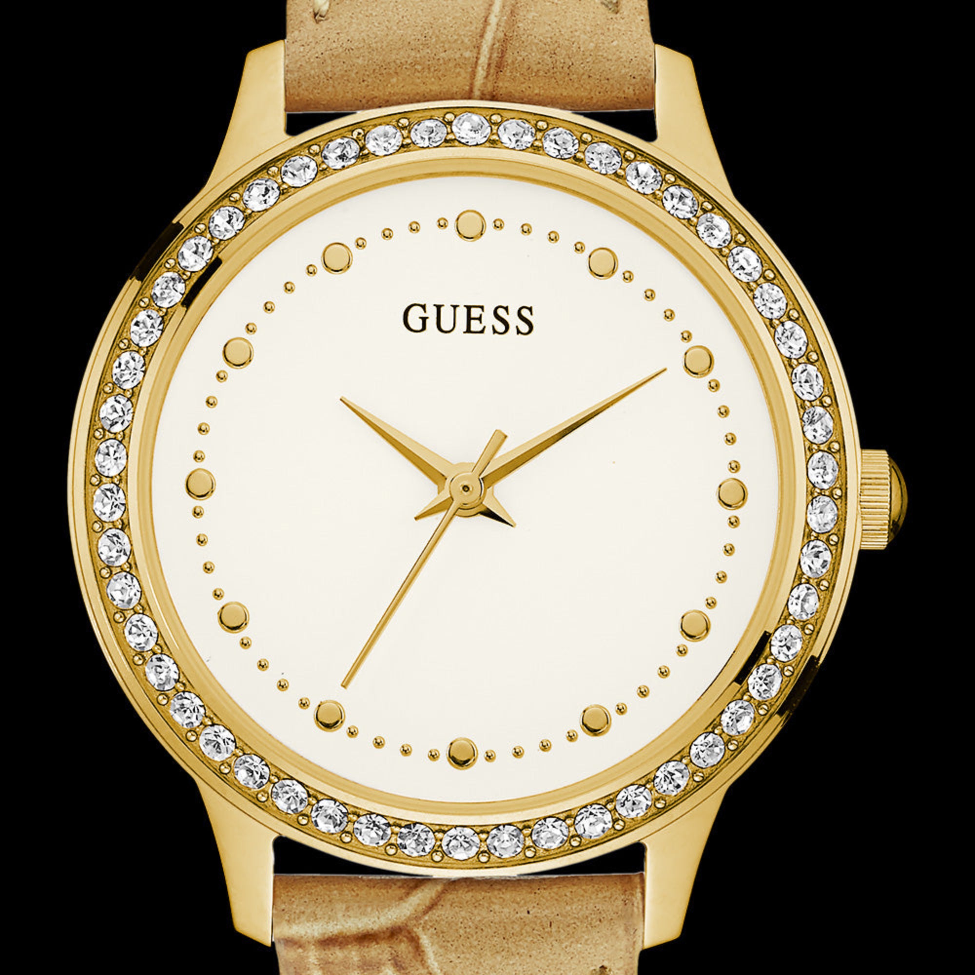 Close-up of Guess Chelsea gold ladies leather dress watch.