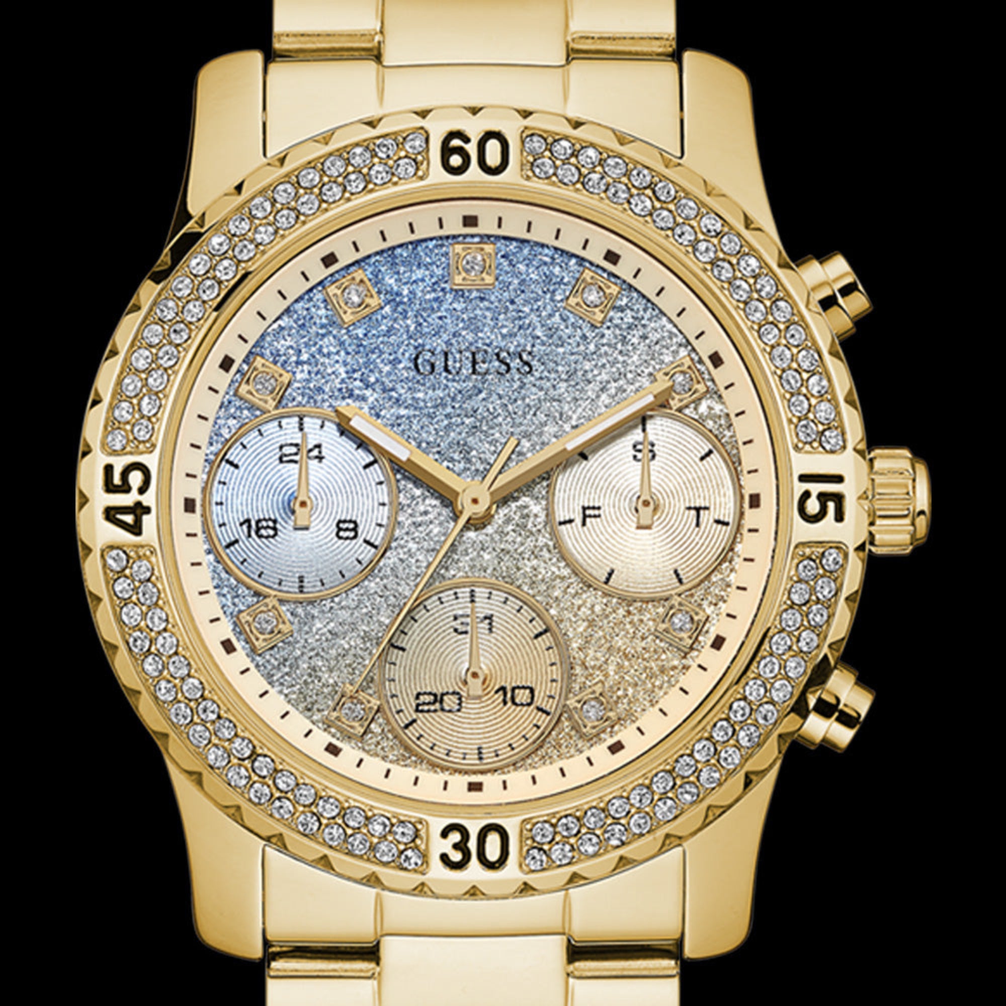 Close-up of Guess Confetti gold ladies sport watch.