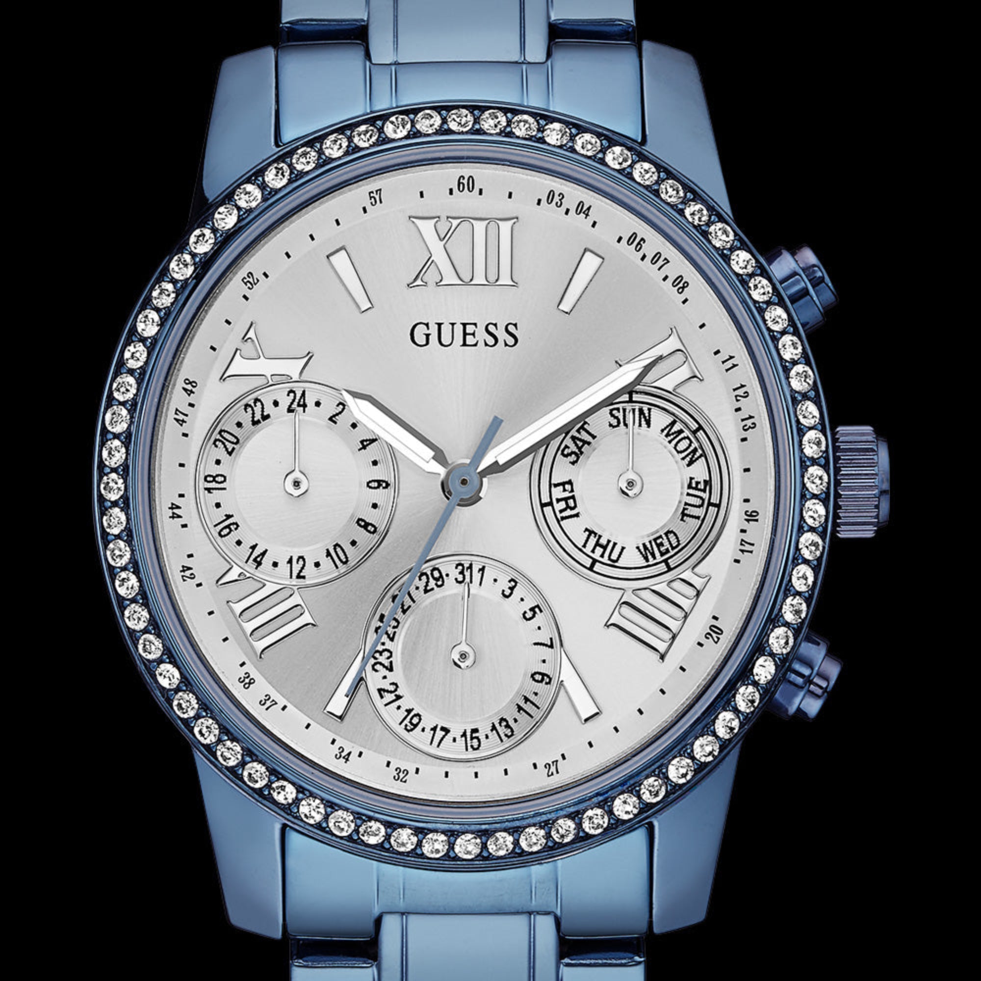 Close-up of Guess Mini Sunrise sky blue ladies sport watch.