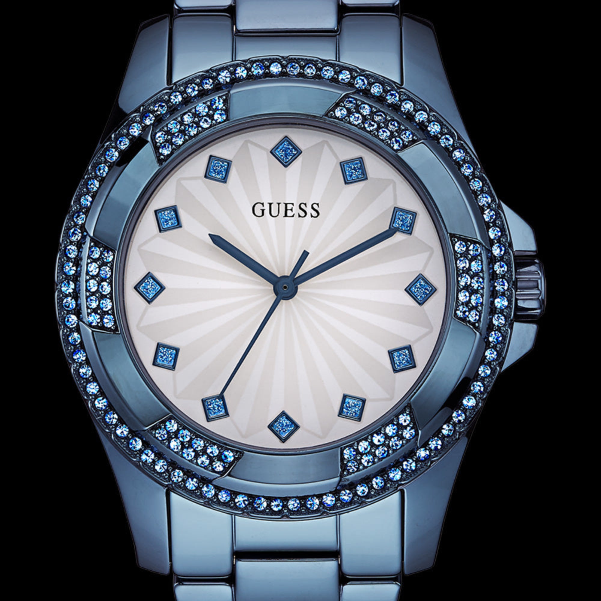 Close-up of Guess Pinwheel sky blue ladies sport watch.
