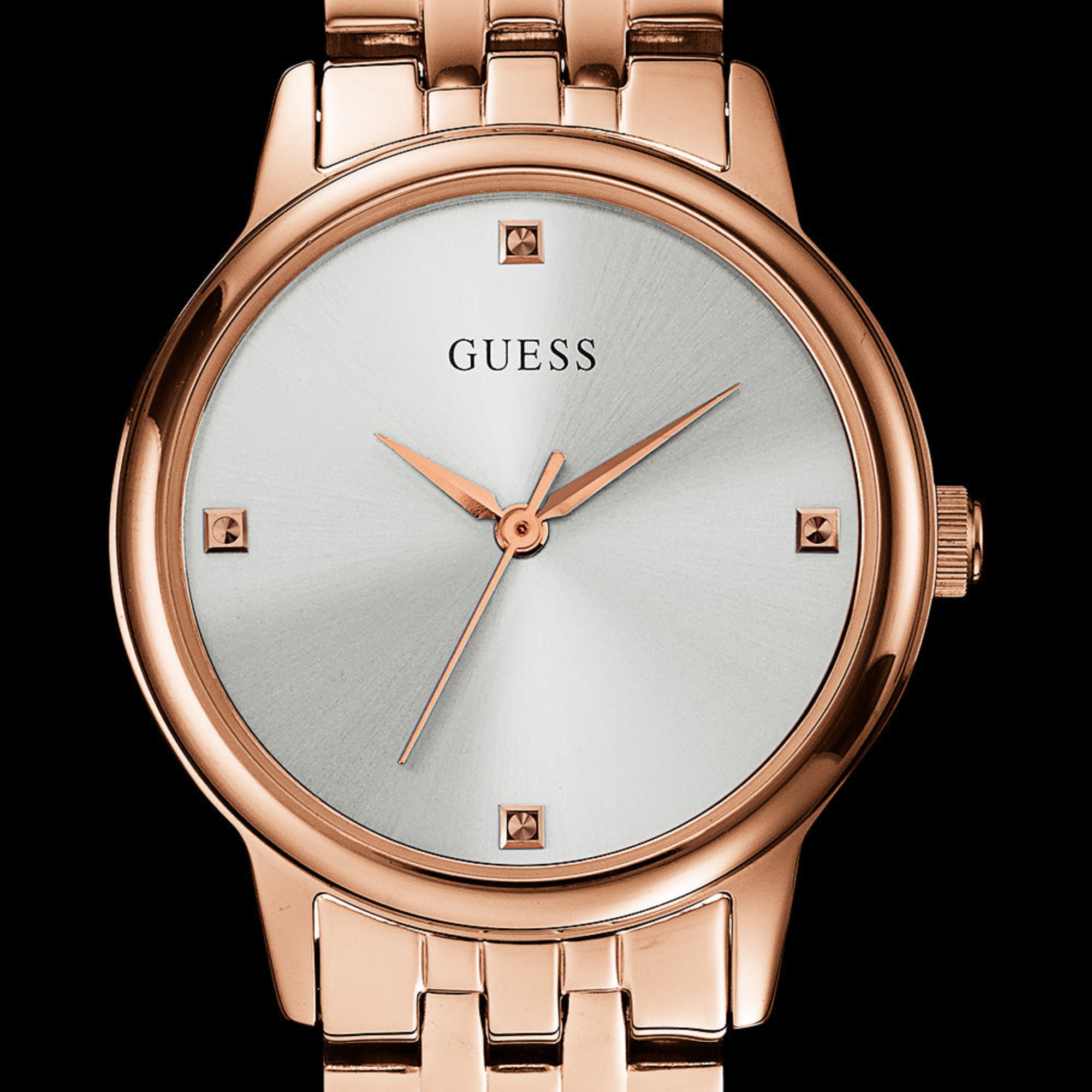 Close-up of Guess Lady Wafer rose gold dress watch.
