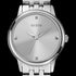 Close-up of Guess Lady Wafer silver dress watch.