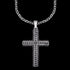 Close up of a rough edge black steel cross men's necklace.