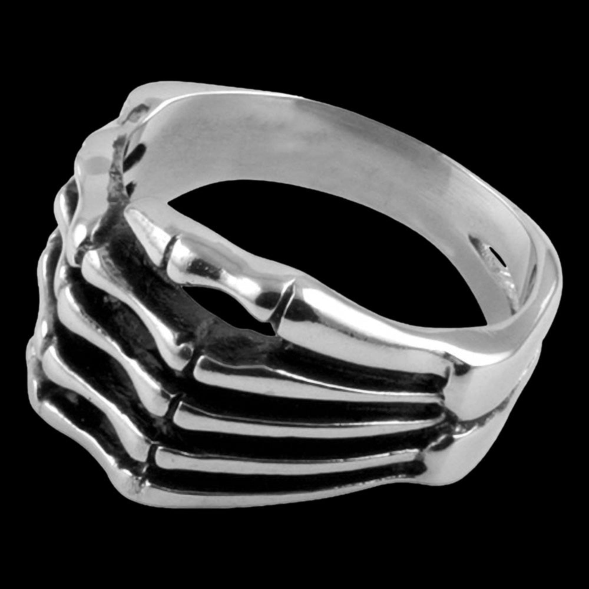 Side view of stainless steel men's skeleton hand ring.
